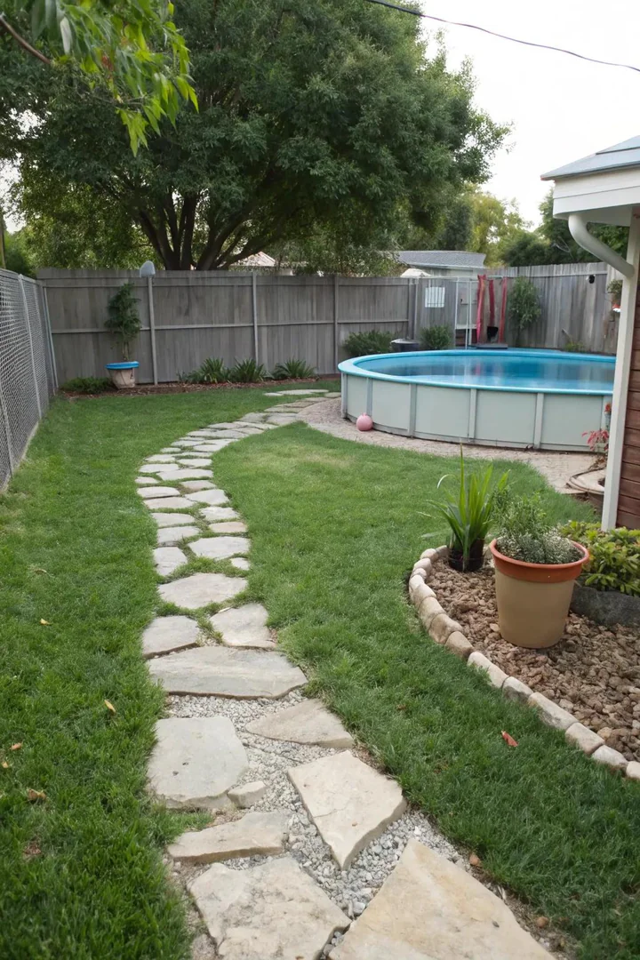 Flagstone stepping stones leading from a patio to an above-ground pool entry point