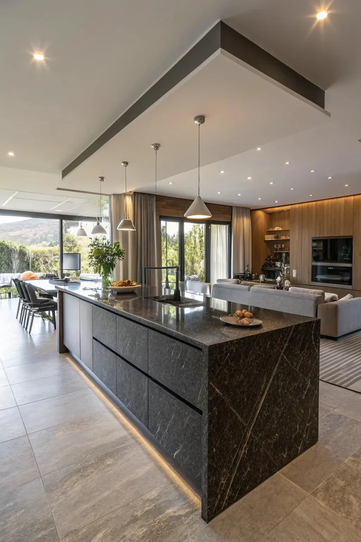 Kitchen peninsula with a large countertop overhang for seating.