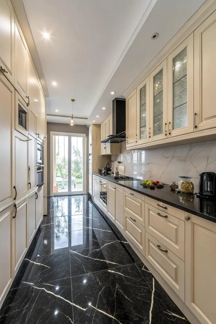 Bold black marble kitchen floor.